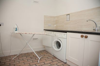 Utility Room at this 2 Bedroom Cottage