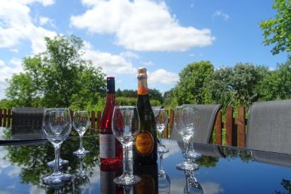 Outdoor dining area at Buttercups Haybarn