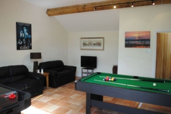 Games room with pool table, air hockey and table football 