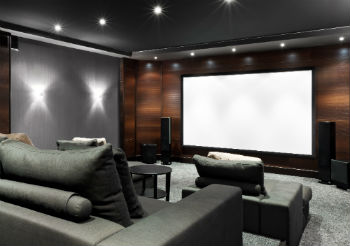 Relax with your family in a cinema room